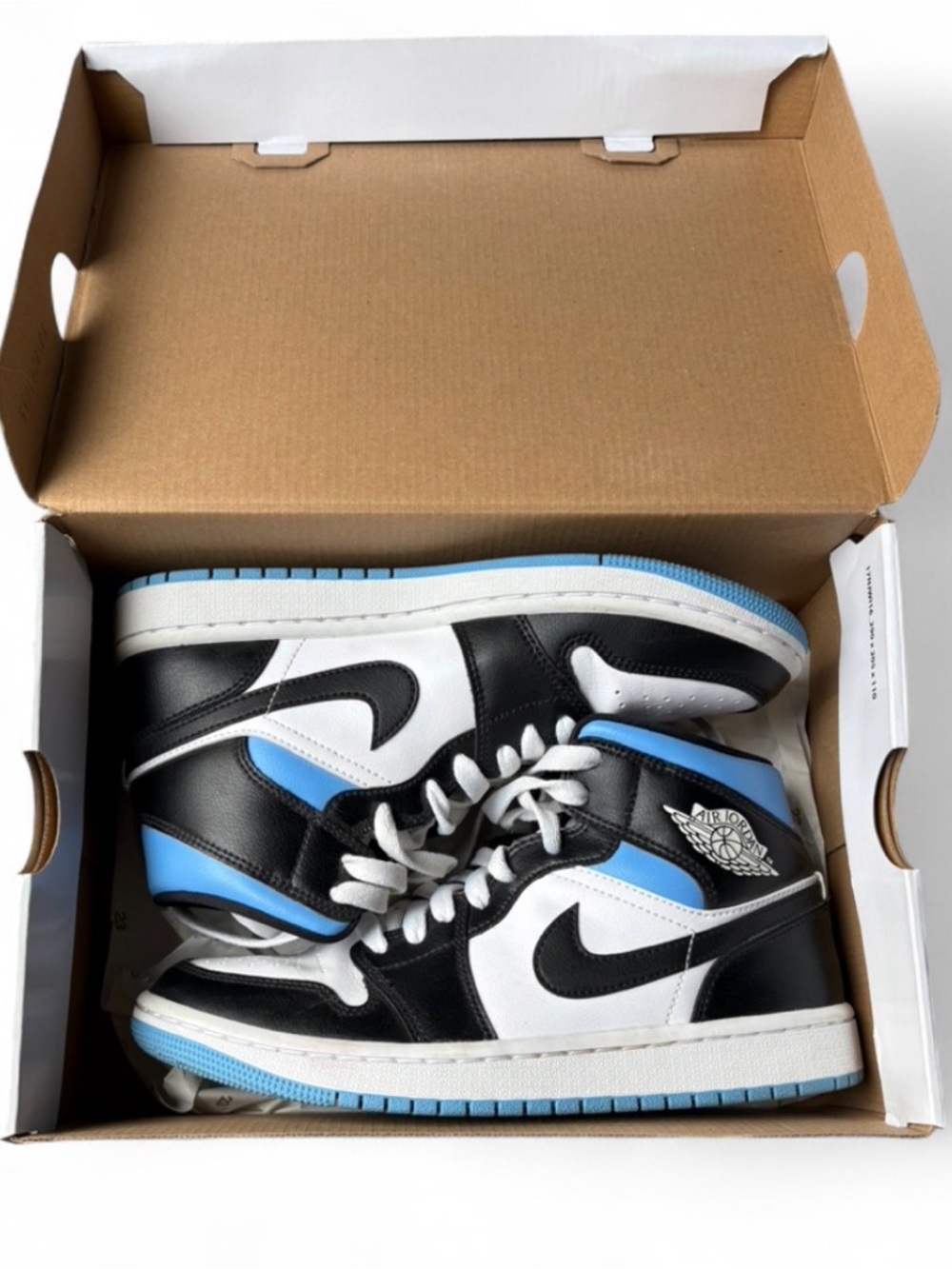 Air Jordan 1 Mid in Black and Blue